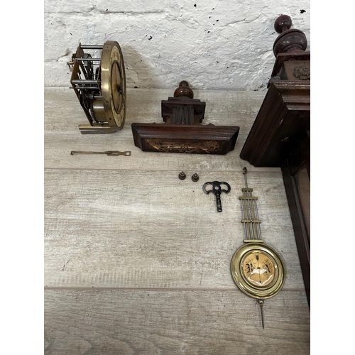 43 - A late 19th/early 20th century walnut cased chiming wall clock with pendulum and key - approx. 85cm ... 