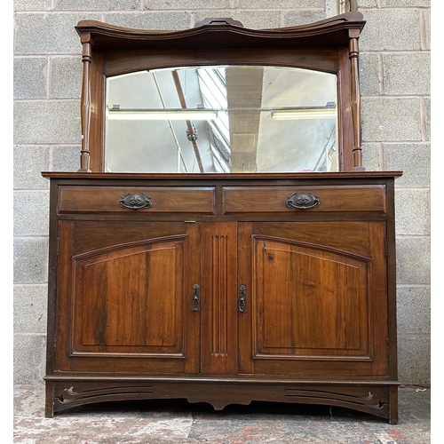 50 - An Art Nouveau carved walnut mirror back sideboard - approx. 182cm high x 135cm wide x 46cm deep