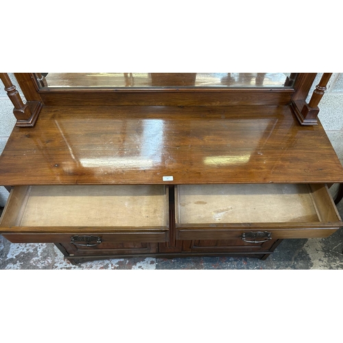 50 - An Art Nouveau carved walnut mirror back sideboard - approx. 182cm high x 135cm wide x 46cm deep