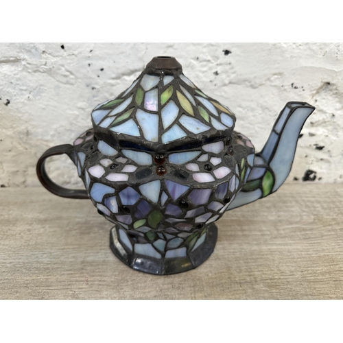 57 - A Tiffany style stained glass teapot lamp shade - approx. 18cm high