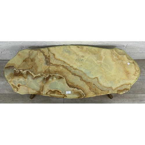 6 - A Rococo style onyx and gilt metal coffee table - approx. 44cm high x 49cm wide x 116cm long