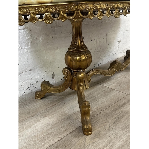 6 - A Rococo style onyx and gilt metal coffee table - approx. 44cm high x 49cm wide x 116cm long