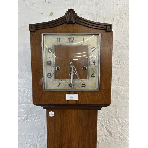 61 - An Art Deco walnut cased Westminster chime grandmother clock with key and pendulum - approx. 167cm h... 