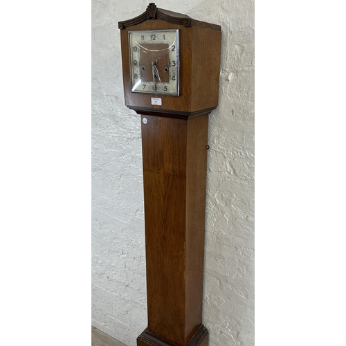 61 - An Art Deco walnut cased Westminster chime grandmother clock with key and pendulum - approx. 167cm h... 