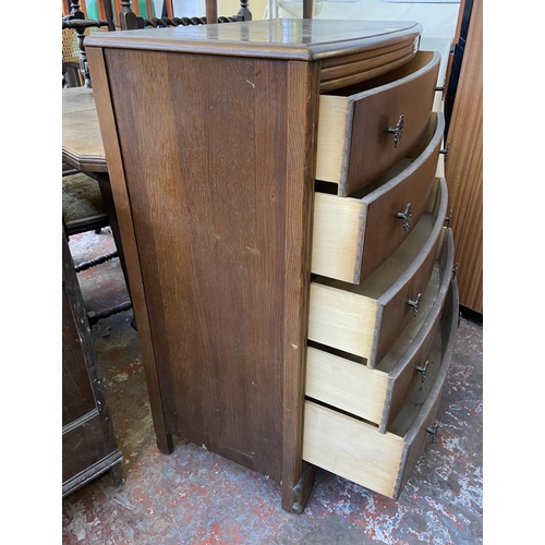 74 - A Lebus oak chest of drawers - approx. 103cm high x 77cm wide x 45cm deep