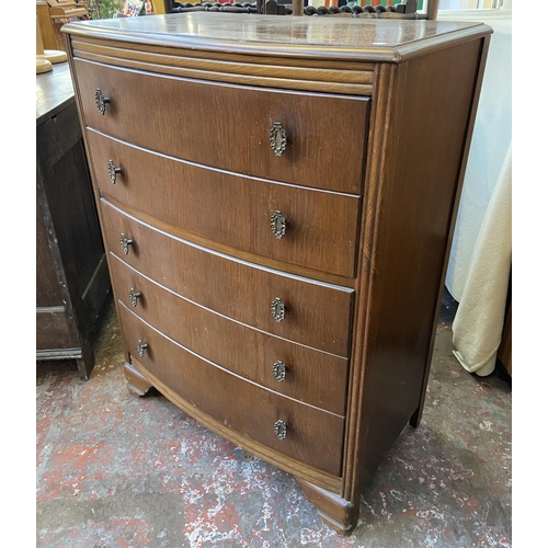 74 - A Lebus oak chest of drawers - approx. 103cm high x 77cm wide x 45cm deep