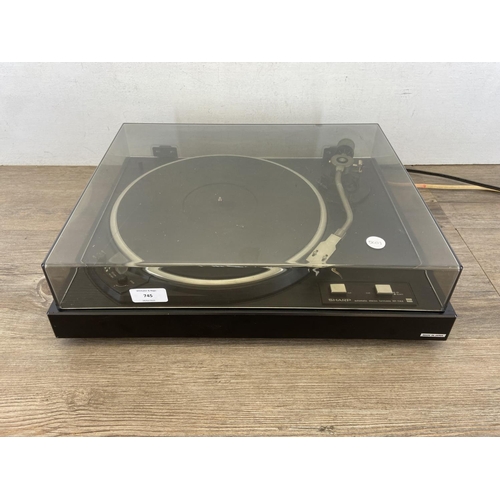 745 - A Sharp RP-1144 two speed automatic stereo turntable