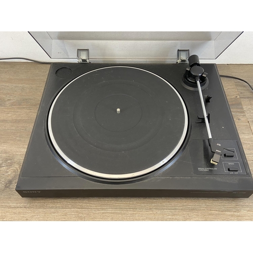 746 - A Sony PS-LX100 two speed servo controlled stereo turntable with instruction manual and record clean... 