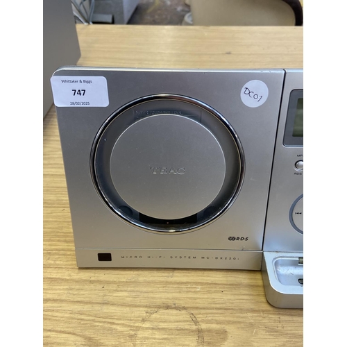 747 - A Teac MC-DX220i micro hi-fi system with three matching speakers