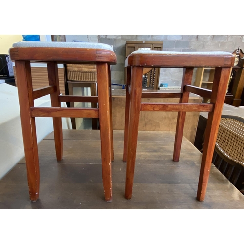 79 - Two mid 20th century stained beech and white vinyl stools - approx. 53cm high x 32cm wide x 32cm dee... 