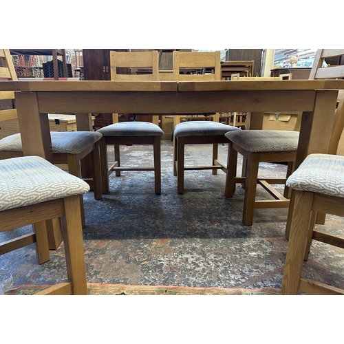 89 - A modern solid oak extending dining table and six chairs - approx. 78cm high x 90cm wide x 140cm lon... 