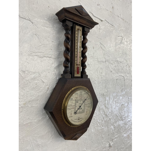 91A - An early 20th century Short & Mason London oak barley twist cased barometer - approx. 50cm high