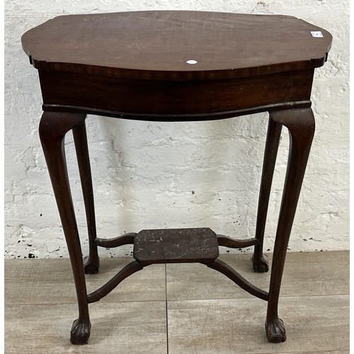 94 - An Edwardian mahogany serpentine two tier side table - approx. 77cm high x 64cm wide x 40cm deep