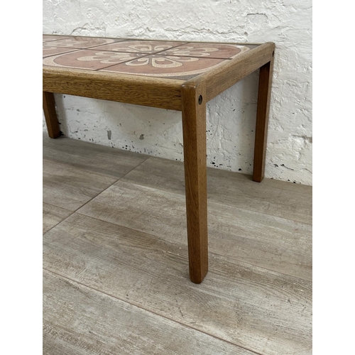 99 - A mid 20th century teak ceramic tile top coffee table - approx. 40cm high x 48cm wide x 86cm long