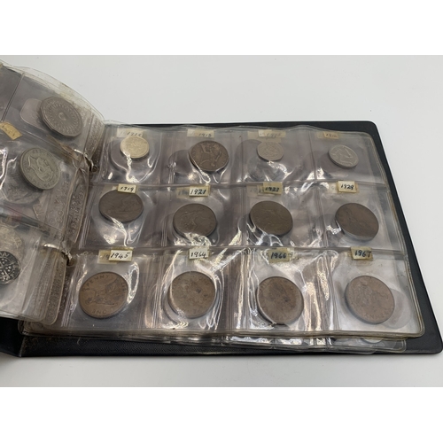 2387 - A coin album containing world coins, hammered silver coins, tokens and medallions to include 50% sil... 