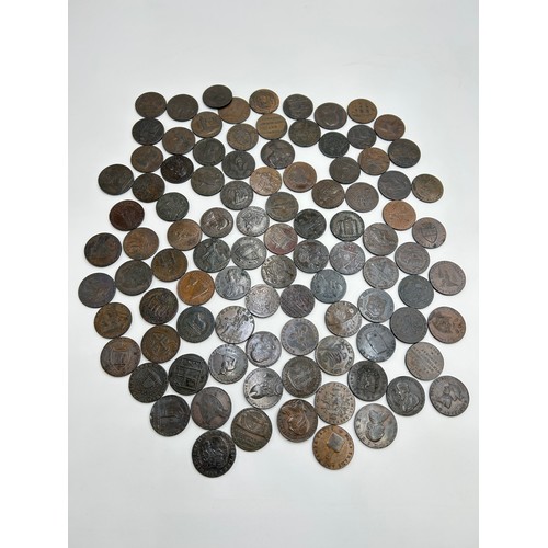 A coin album containing ninety-seven conder tokens to include Chichester and Portsmouth halfpenny, 1791 Hull halfpenny, 1792 Lancaster halfpenny, Macclesfield halfpenny etc.