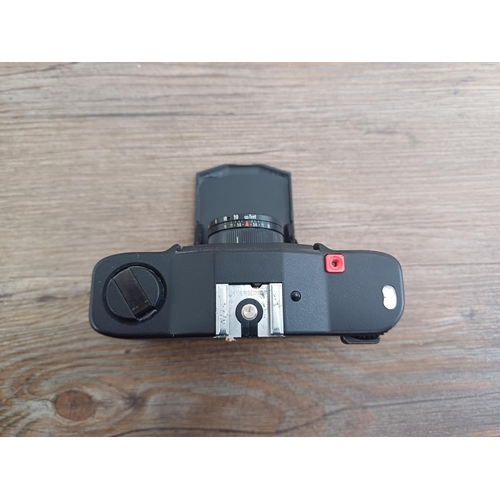 957 - Two Minox cameras, one EL 35 ultra-compact 35mm camera fitted with FC35 flash and one 110S for 110 f... 