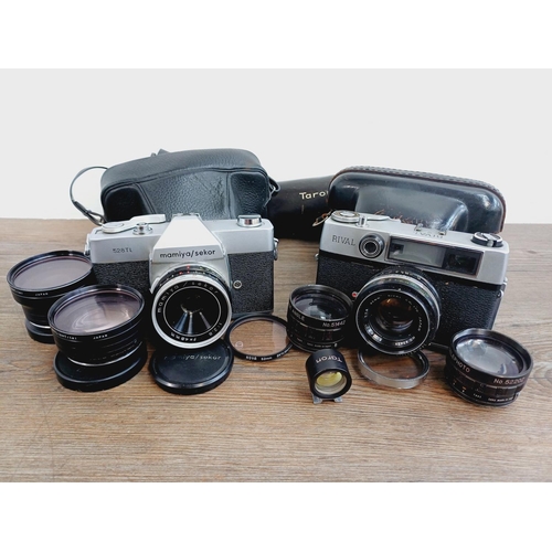 959 - Two cased vintage Japanese 35mm cameras with their cased auxiliary lenses, one Mamiya/Sekor 528TL le... 