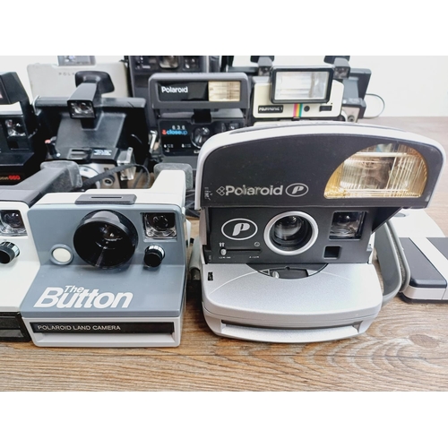 952 - Twelve instant cameras to include Polaroid The Button, Polaroid P, Kodak EK160, Polaroid Land camera... 