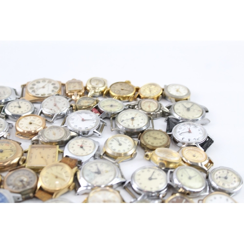 2077 - Approx. sixty hand wind lady's watch heads