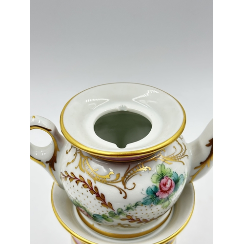 538 - A French Sevres style hand painted porcelain Veilleuse teapot - approx. 22cm high