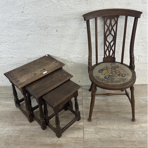 81 - Two pieces of furniture, one 17th century style oak nest of tables and one Edwardian inlaid mahogany... 