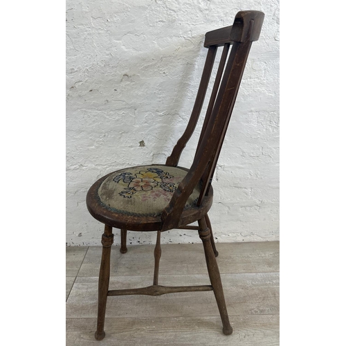 81 - Two pieces of furniture, one 17th century style oak nest of tables and one Edwardian inlaid mahogany... 