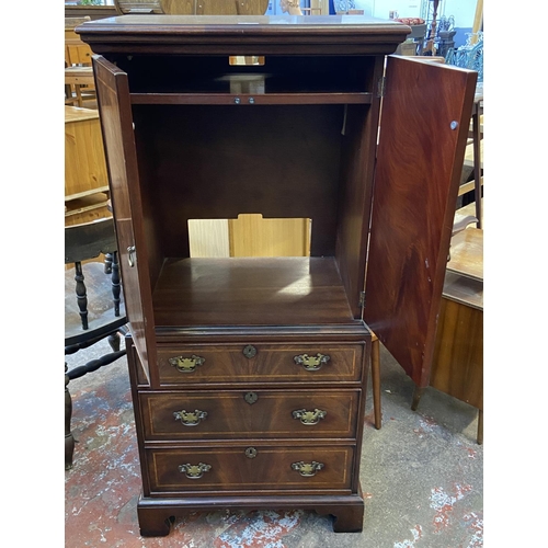 84 - A Georgian style inlaid mahogany TV cabinet - approx. 137cm high x 60cm wide x 42cm deep