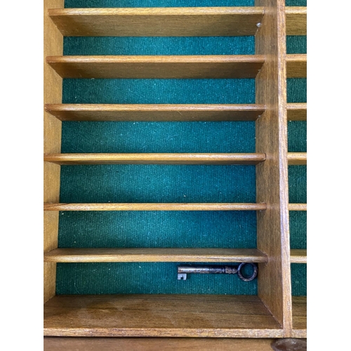 84 - A Georgian style inlaid mahogany TV cabinet - approx. 137cm high x 60cm wide x 42cm deep