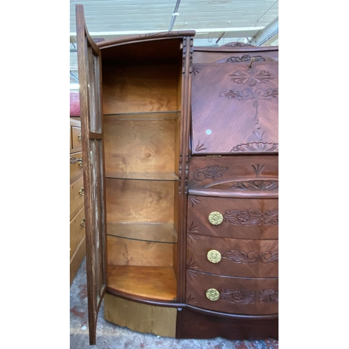 109 - An early/mid 20th century stained and carved oak side by side bureau bookcase - approx. 122cm high x... 