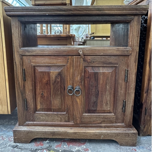 157 - Two pieces of Indian sheesham wood furniture, one TV cabinet and one CD cabinet