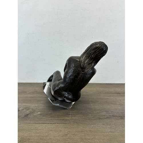 773 - A hand finished cold cast bronzed resin female seated nude figurine - approx. 45cm high