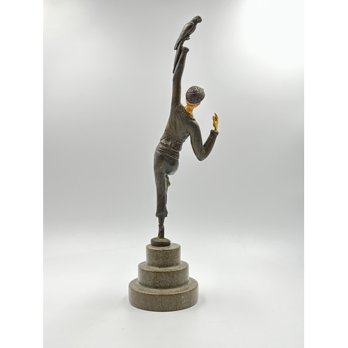 774A - An Art Deco style cast bronze sculpture after D.H.Chiparus depicting a woman with bird in hand - app... 