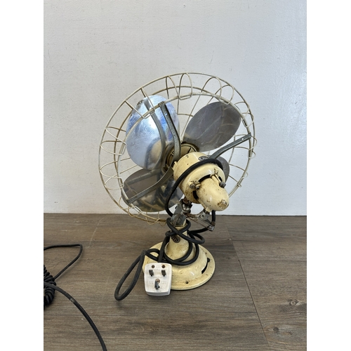 783 - Two mid 20th century items, one Limit cream enamel painted electric desk fan and one GPO 332L black ... 