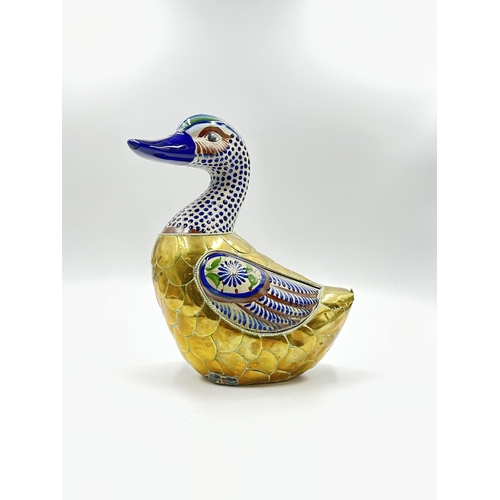 787 - A Mexican folk art Tonala pottery and brass duck - approx. 26cm high