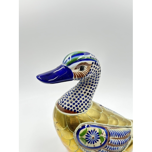 787 - A Mexican folk art Tonala pottery and brass duck - approx. 26cm high