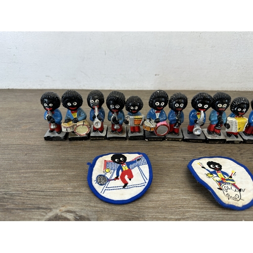 791 - A collection of Robertson's advertising collectables to include hand painted jazz band figurines, Di... 