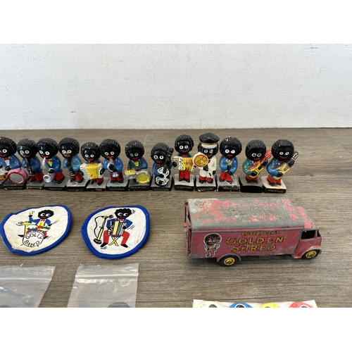 791 - A collection of Robertson's advertising collectables to include hand painted jazz band figurines, Di... 