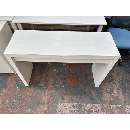 323 - An IKEA Malm white laminate office desk with glass top - approx. 78cm high x 120cm wide x 41cm deep