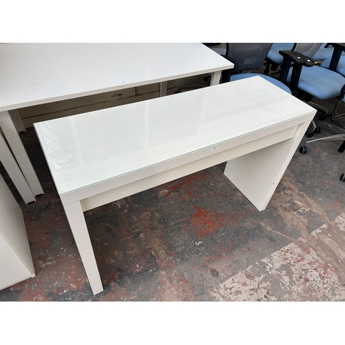 323 - An IKEA Malm white laminate office desk with glass top - approx. 78cm high x 120cm wide x 41cm deep