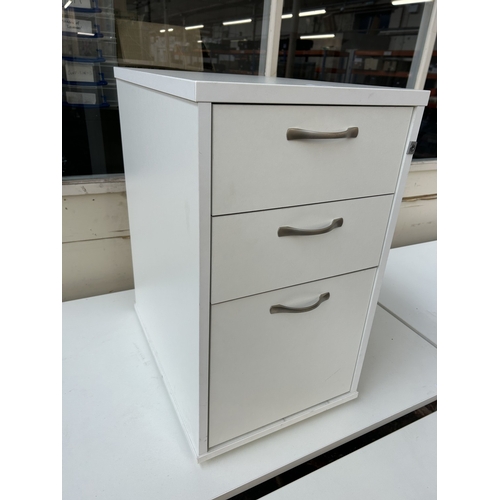 325 - A modern white laminate three drawer office filing cabinet - approx. 74cm high x 43cm wide x 60cm de... 