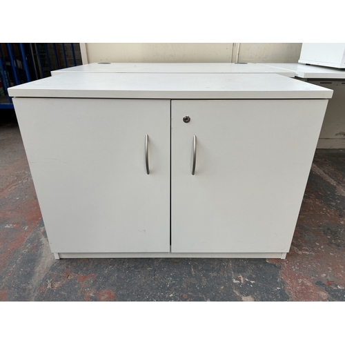 327 - A modern white laminate two door office cabinet - approx. 72cm high x 100cm wide x 50cm deep