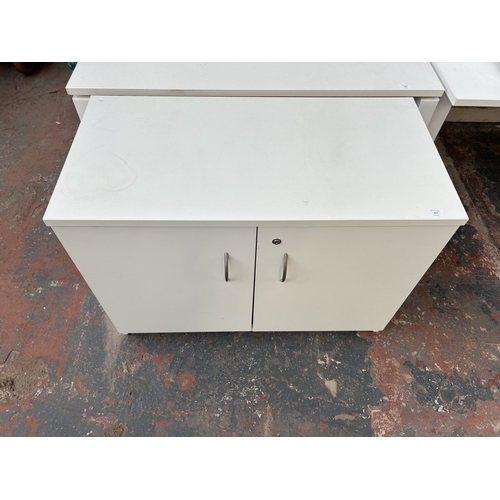 327 - A modern white laminate two door office cabinet - approx. 72cm high x 100cm wide x 50cm deep