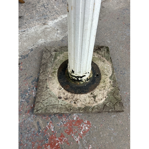 328 - A Victorian white painted cast iron water pump - approx. 137cm high