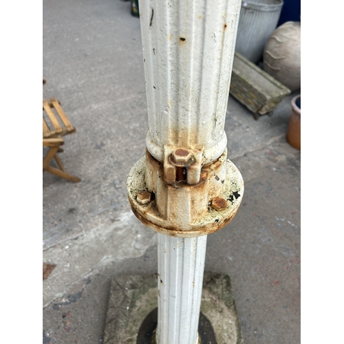 328 - A Victorian white painted cast iron water pump - approx. 137cm high