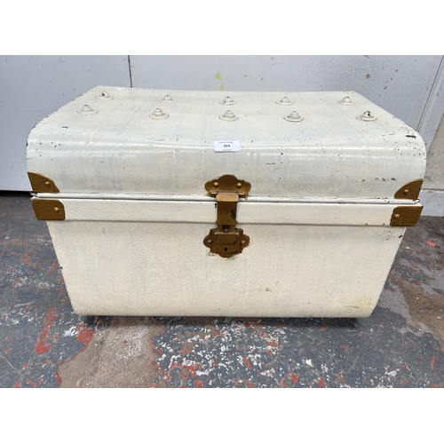 354 - An early 20th century painted metal travel trunk - approx. 42cm high x 59cm wide x 42cm deep