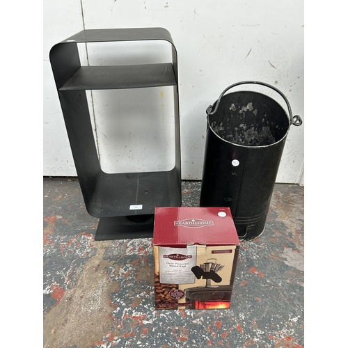 399 - Three fireside items, one boxed Hearth & Home heat powered stove fan, one black metal coal bucket an... 