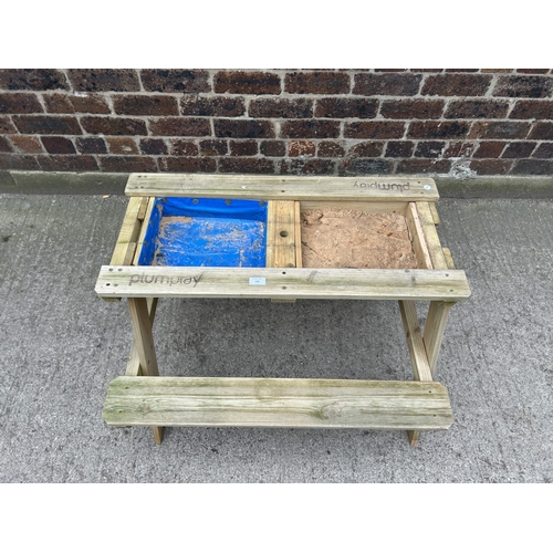 410 - A Plum Play wooden children's sand and water picnic table - approx. 51cm high x 86cm wide x 86cm lon... 