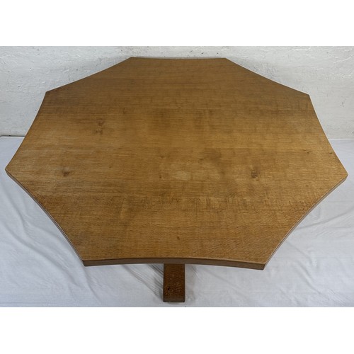 316 - A Robert 'Mouseman' Thompson adzed oak octagonal dining table - approx. 74cm high x 135cm wide x 135... 