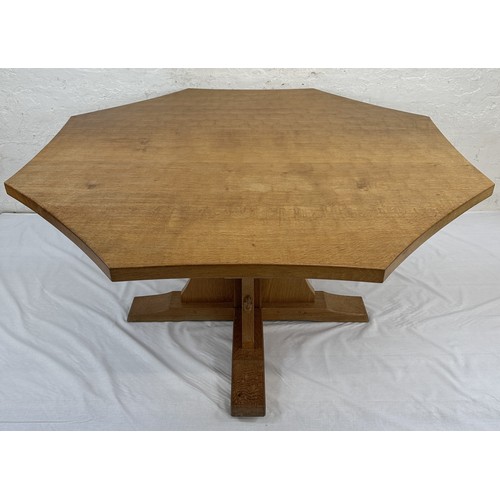 316 - A Robert 'Mouseman' Thompson adzed oak octagonal dining table - approx. 74cm high x 135cm wide x 135... 